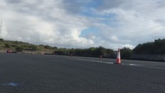 Teenage stunt driver slides around and flips bottle