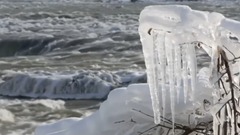 Niagara Falls partially frozen over in North American cold snap